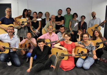 Cours de guitare en entreprise